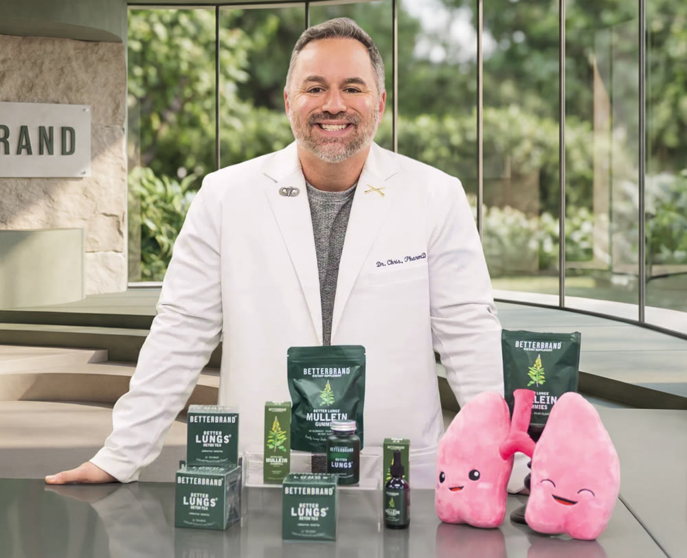 Dr. Chris, PharmD, standing behind the BetterLungs Mullein Gummies and the rest of the line